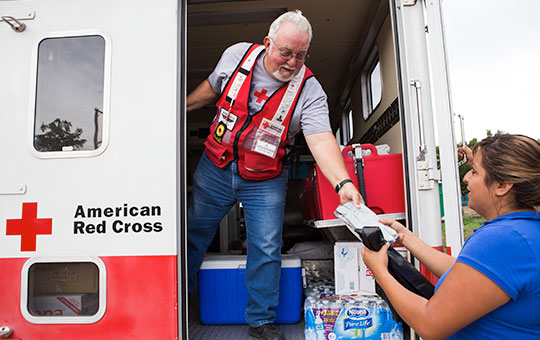 American Red Cross volunteers working out of an ambulance